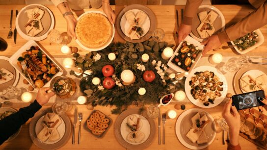 holiday table. Elderly parents caring for